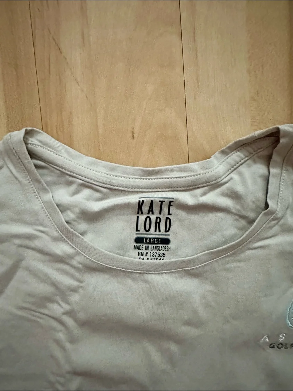 Kate Lord Hat & Shirt - Aspen Golf Club